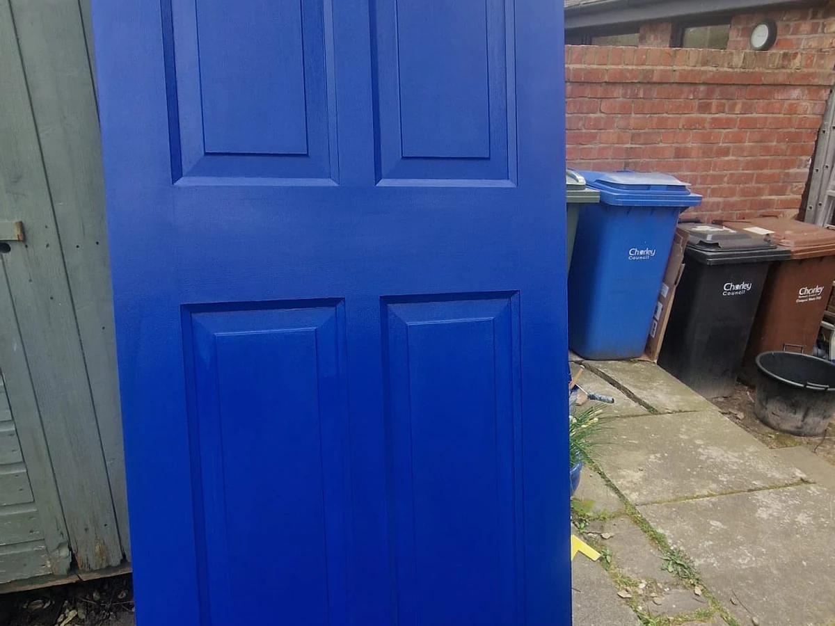 Door painting in Preston by Rose Decor — blue finished front door, professional painters and decorators