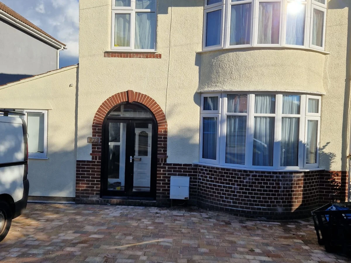 Render painting in Preston by Rose Decor — exterior house painting after cream finish on rendered semi-detached