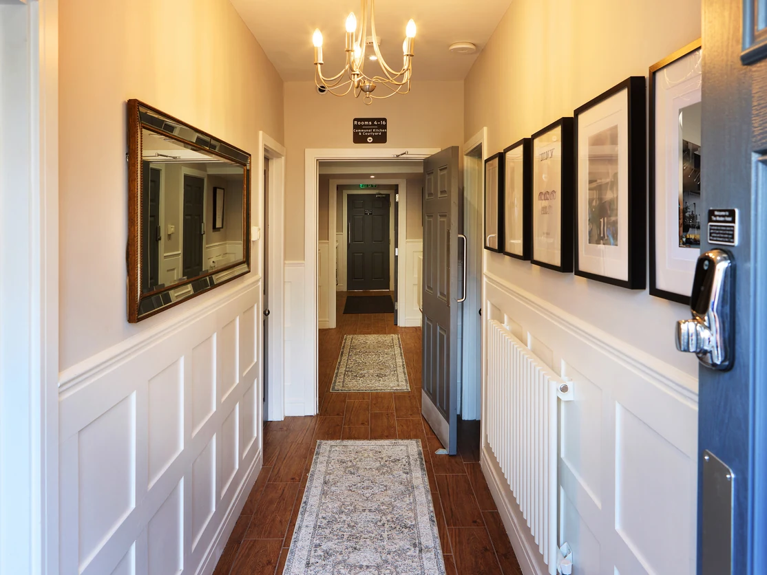 White wainscoting panelling in a painted hallway in Preston by Rose Decor, timber panelling specialists